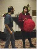 David Levine, Martha Bayles, and a red fuzzy object (link to larger version) 